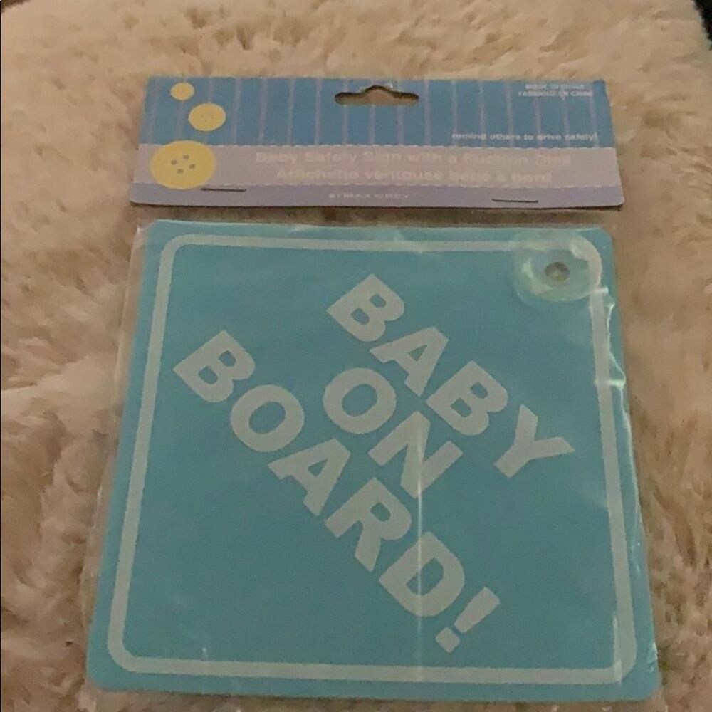 Blue baby on board sign with suction cup